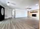 Spacious living room with brick fireplace and hardwood floors at 108 Vance Allen Ave, Rockwell, NC 28138