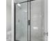Modern shower with frameless glass door and marble tile at 108 Vance Allen Ave, Rockwell, NC 28138