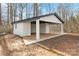 Detached workshop with covered patio and large doors at 108 Vance Allen Ave, Rockwell, NC 28138