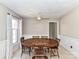 Cozy dining room featuring an oval wooden table, fan, and natural light, perfect for Gathering meals at 1098 Woodshire Ct, Rock Hill, SC 29730