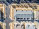 Aerial view of townhouses with gray roofs and attached garages at 1412 Galloway Rd, Charlotte, NC 28262