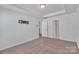 Bright bedroom with neutral walls and carpet at 1412 Galloway Rd, Charlotte, NC 28262