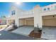 Rear view of three-car garage with covered parking and AC units at 1412 Galloway Rd, Charlotte, NC 28262