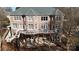 Aerial view of a backyard with multi-level decks and covered patios at 14407 Brick Church Ct, Charlotte, NC 28277