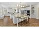 Spacious kitchen with stainless steel appliances, double islands, and ample cabinet space at 14407 Brick Church Ct, Charlotte, NC 28277