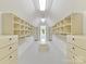 Spacious walk-in closet with custom shelves and storage at 14407 Brick Church Ct, Charlotte, NC 28277