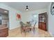 Charming dining room with glass table and hardwood floors at 1615 Deer Run Rd, Catawba, SC 29704