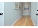 Bright hallway with light walls and hardwood floors at 1615 Deer Run Rd, Catawba, SC 29704