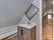 Charming bathroom vanity with a framed mirror, cabinet storage, and a white countertop at 210 Goff St, Charlotte, NC 28208