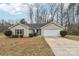 Charming single-story home with a well-maintained lawn, inviting curb appeal, and a two-car garage at 2364 Nuthatch Dr, Rock Hill, SC 29732