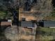 Aerial view of a cozy neighborhood highlighting a charming home with spacious backyard at 3004 Briarwood Ln, Gastonia, NC 28056