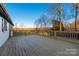 Spacious back deck with wood flooring perfect for outdoor entertaining and relaxation at 3004 Briarwood Ln, Gastonia, NC 28056
