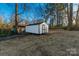 Backyard featuring a utility shed, offering ample storage and functionality at 3004 Briarwood Ln, Gastonia, NC 28056