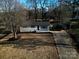 Charming single-story house with manicured lawn and convenient covered parking space at 3004 Briarwood Ln, Gastonia, NC 28056