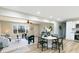 Stylish living room with a blend of seating, table, and dining arrangements at 3004 Briarwood Ln, Gastonia, NC 28056