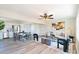 Modern living room featuring sleek hardwood floors, contemporary furnishings, and stainless steel appliances at 3004 Briarwood Ln, Gastonia, NC 28056