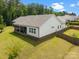 Spacious backyard with a screened-in porch and manicured lawn, perfect for outdoor relaxation and entertaining at 315 Skyebrook Ln, Rock Hill, SC 29730