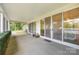 Covered patio with sliding glass doors offering seamless indoor-outdoor living and views of the backyard and kitchen at 315 Skyebrook Ln, Rock Hill, SC 29730