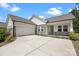 Charming single-story home with a wide driveway, stone accents, and well-maintained landscaping at 315 Skyebrook Ln, Rock Hill, SC 29730