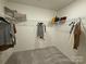 Spacious walk-in closet featuring wire shelving for clothing and storage at 326 Knotty Wood Dr # 66, Monroe, NC 28110