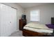 Cozy bedroom with a double bed and closet at 3721 Braden Dr, Charlotte, NC 28216