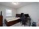 Bedroom with double bed, desk, and chair at 3721 Braden Dr, Charlotte, NC 28216