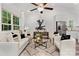 Stylish open floor plan with a bright living area seamlessly connected to the kitchen at 404 Killian Ave, Mount Holly, NC 28120
