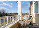 Cozy balcony featuring stylish chair with wicker accents and exterior views at 4194 La Crema Dr, Charlotte, NC 28214