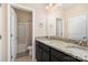 Bathroom featuring granite countertops and a double sink vanity at 4194 La Crema Dr, Charlotte, NC 28214