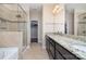 Beautiful bathroom with a glass shower, soaking tub, granite countertop vanity and tile floors at 4194 La Crema Dr, Charlotte, NC 28214