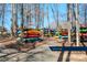 Outdoor kayak storage racks offer convenient organization in a natural setting at 4194 La Crema Dr, Charlotte, NC 28214
