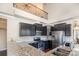 Modern kitchen with stainless steel appliances, granite countertops, and high ceilings at 4194 La Crema Dr, Charlotte, NC 28214