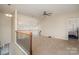 Spacious upper living room with lots of natural light and a view of the lower floor at 4194 La Crema Dr, Charlotte, NC 28214