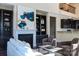 Inviting living room with fireplace, built-in bookshelves, and comfortable seating, creating a cozy atmosphere at 4194 La Crema Dr, Charlotte, NC 28214