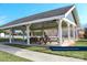 Covered picnic area with tables, ideal for outdoor gatherings near the tennis courts at 4194 La Crema Dr, Charlotte, NC 28214