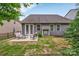 A cozy backyard with patio, seating, and well-maintained lawn at 4929 Norman Park Pl, Clover, SC 29710