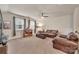 Cozy bonus room with comfortable seating, natural light, and a ceiling fan at 4929 Norman Park Pl, Clover, SC 29710