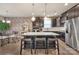 Modern kitchen featuring stainless steel appliances, dark cabinets, and a center island with seating at 4929 Norman Park Pl, Clover, SC 29710