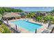 Aerial view of a community pool with lounge chairs and surrounding amenities at 4929 Norman Park Pl, Clover, SC 29710