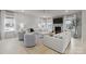 Spacious living room with a stone fireplace, large windows, and neutral decor at 5024 Hillshire Ln, Mint Hill, NC 28227