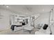 Bright, open living room with modern decor and seamless flow to the kitchen at 5024 Hillshire Ln, Mint Hill, NC 28227