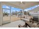 Covered patio with comfortable seating and a view of the backyard featuring a playset at 5024 Hillshire Ln, Mint Hill, NC 28227