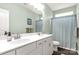 Bathroom featuring double sink vanity with white cabinetry and modern fixtures at 515 Stickley Pl, Lancaster, SC 29720