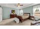 Cozy bedroom features large windows, neutral walls, and tray ceiling at 515 Stickley Pl, Lancaster, SC 29720