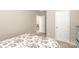 Cozy bedroom featuring neutral walls, carpet flooring, and ample closet space at 515 Stickley Pl, Lancaster, SC 29720