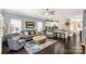 Living room and kitchen with an open floor plan and stylish furnishings at 515 Stickley Pl, Lancaster, SC 29720
