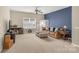 Comfortable living room with large windows providing plenty of natural light at 515 Stickley Pl, Lancaster, SC 29720