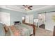 Spacious main bedroom featuring a tray ceiling and connecting to the bathroom via a sliding barn door at 515 Stickley Pl, Lancaster, SC 29720