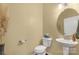 Charming powder room with pedestal sink, toilet, and decorative accents at 515 Stickley Pl, Lancaster, SC 29720