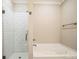 Bathroom with soaking tub and a separate shower at 5422 Army Rd, Marshville, NC 28103